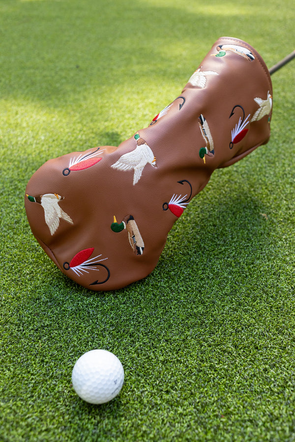 "Duck Hook" driver headcover by Tall Pines Golf, on the grass