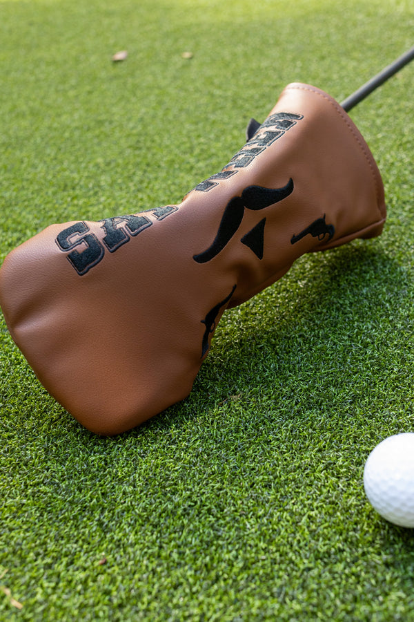 "Say When" fairway wood headcover by Tall Pines Golf, on the grass