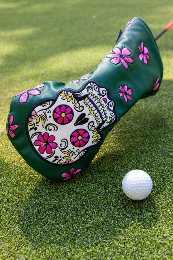 "Augusta Sugar Skull" driver headcover by Tall Pines Golf, on the grass